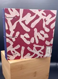 Carnet aquarelle 15x15 script sur fond rouge