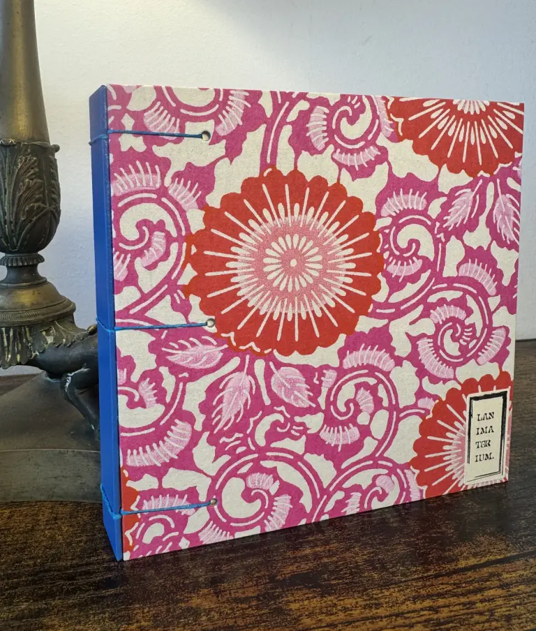 carnet aquarelle washi paper fleur rose sur fond orange reliure criss-cross